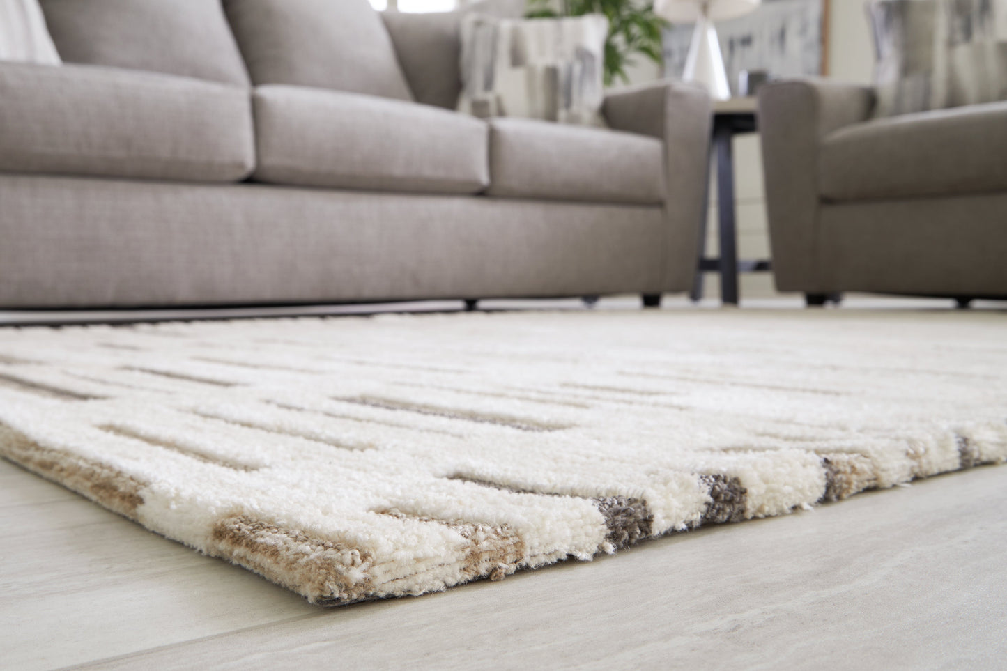 Leesdale Ivory/Brown/Black 5' x 7' Rug - R406422 - Luna Furniture - Dallas Store