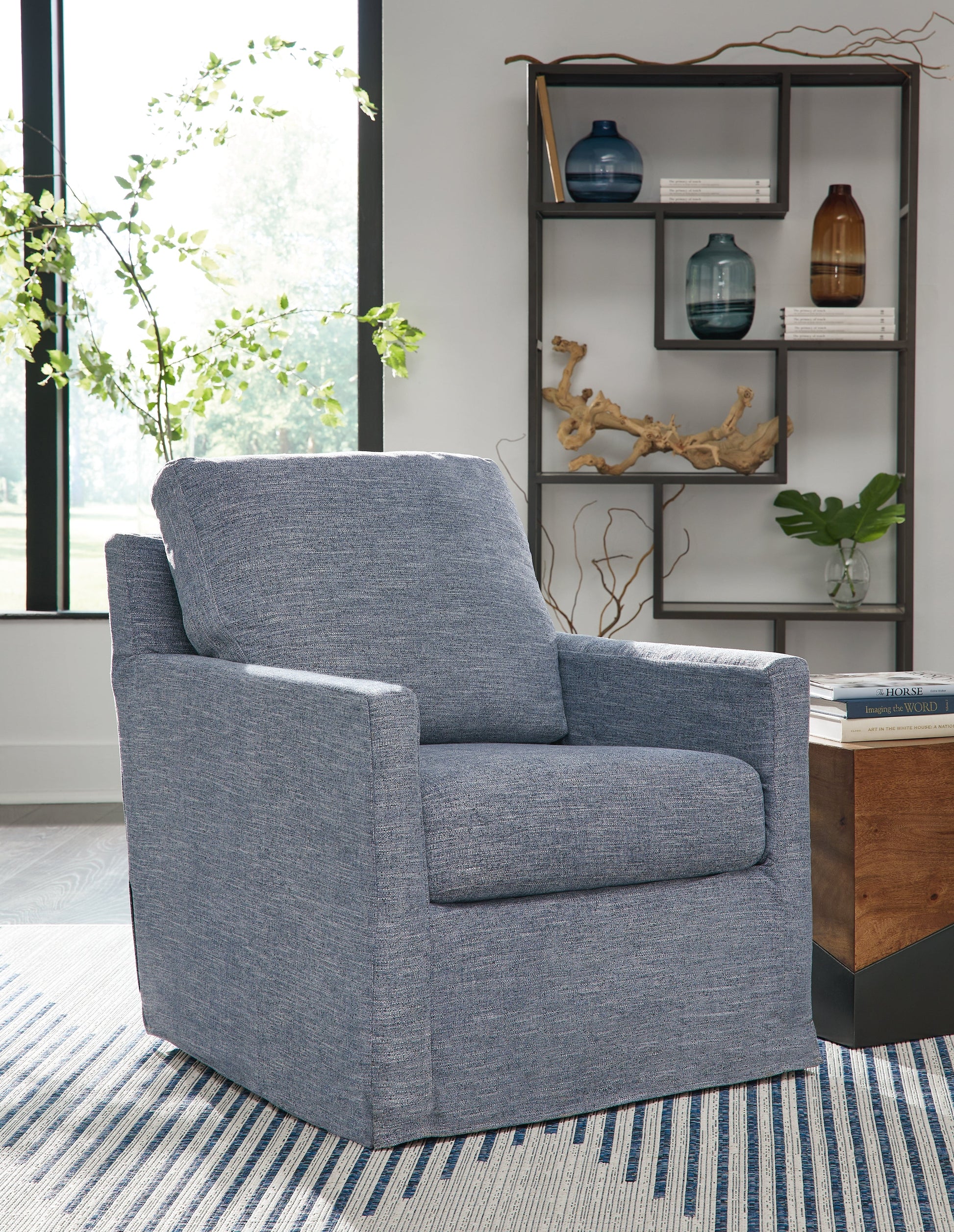 Nenana Next-Gen Nuvella Denim Swivel Glider Accent Chair - A3000646 - Luna Furniture - Dallas Store