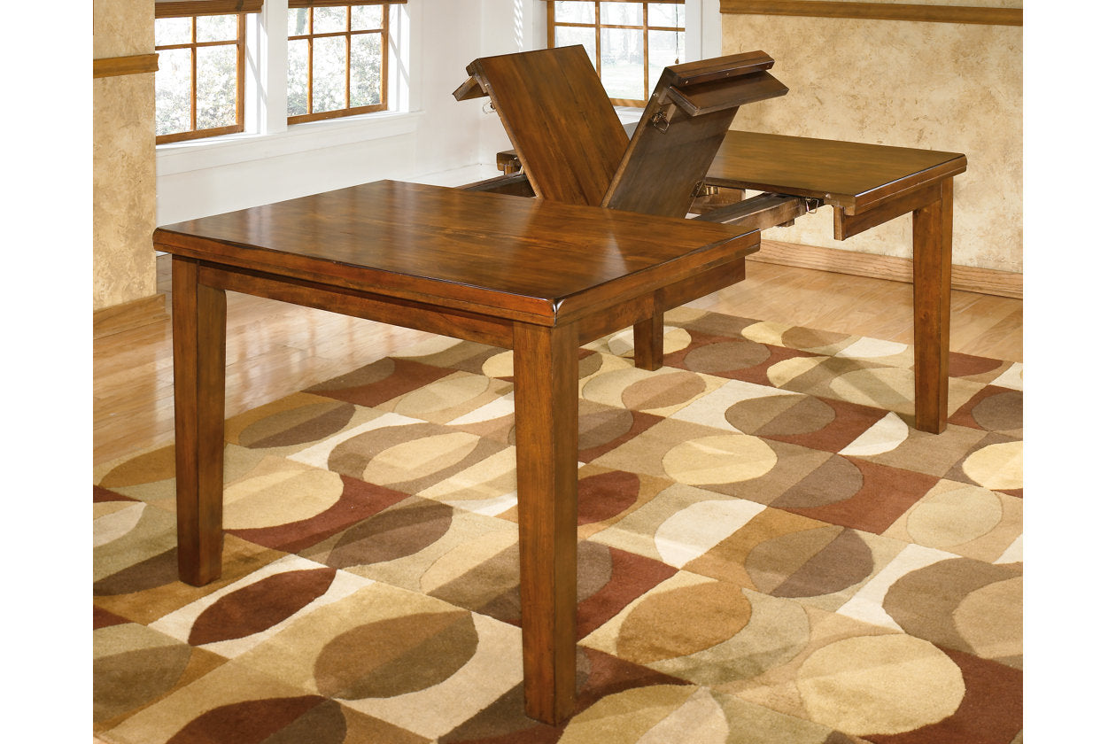 Ralene Medium Brown Dining Extension Table - D594-35 - Luna Furniture - Dallas Store